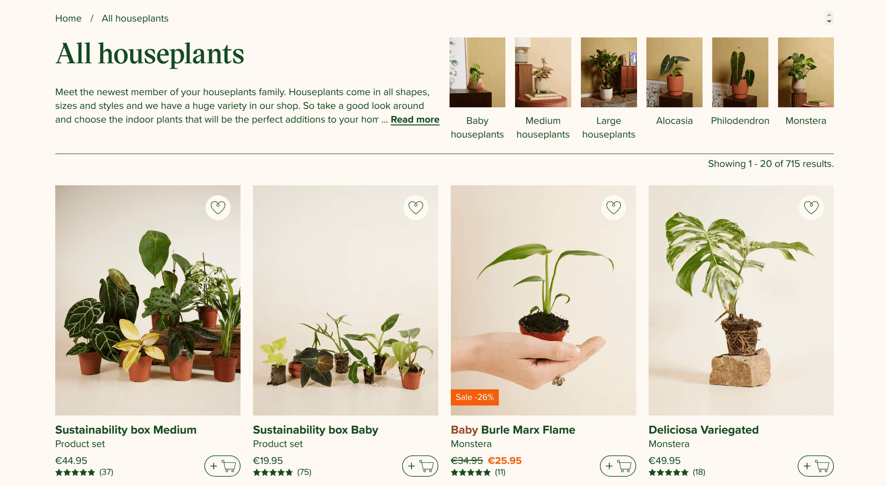 Person carefully unboxing a houseplant delivered to their home